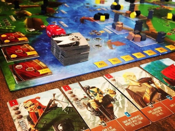 The townsfolk cards, offering tiles and other components from Raiders of the North Sea (Photo courtesy of Garphill Games)